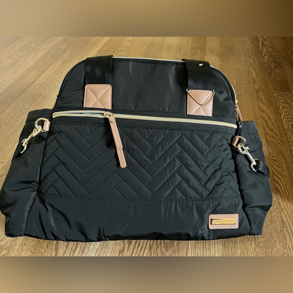Brand new skip hop diaper bag with changing pad